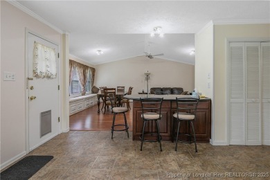 Live the dream in this stunning home on the golf course just on Cypress Lakes Golf Course in North Carolina - for sale on GolfHomes.com, golf home, golf lot