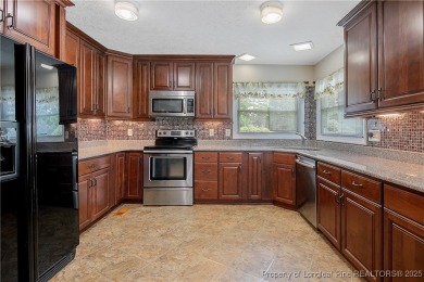 Live the dream in this stunning home on the golf course just on Cypress Lakes Golf Course in North Carolina - for sale on GolfHomes.com, golf home, golf lot