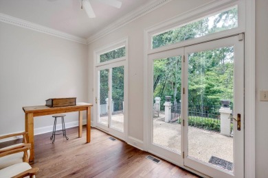 Nestled privately on coveted Charles Towne Place - a quiet on Woodside Plantation Country Club in South Carolina - for sale on GolfHomes.com, golf home, golf lot