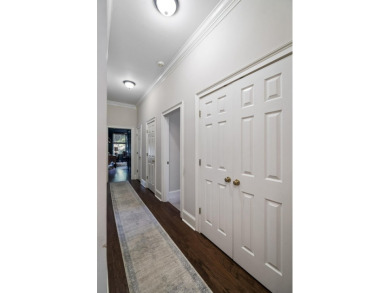 Nestled privately on coveted Charles Towne Place - a quiet on Woodside Plantation Country Club in South Carolina - for sale on GolfHomes.com, golf home, golf lot