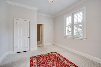 Nestled privately on coveted Charles Towne Place - a quiet on Woodside Plantation Country Club in South Carolina - for sale on GolfHomes.com, golf home, golf lot