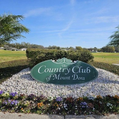 Under contract-accepting backup offers. Charming Home in Mount on Country Club of Mount Dora in Florida - for sale on GolfHomes.com, golf home, golf lot