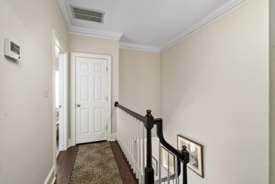 Nestled privately on coveted Charles Towne Place - a quiet on Woodside Plantation Country Club in South Carolina - for sale on GolfHomes.com, golf home, golf lot