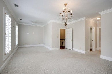 Nestled privately on coveted Charles Towne Place - a quiet on Woodside Plantation Country Club in South Carolina - for sale on GolfHomes.com, golf home, golf lot