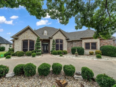 Welcome to this beautifully updated, custom-built single-story on Pecan Plantation Country Club in Texas - for sale on GolfHomes.com, golf home, golf lot
