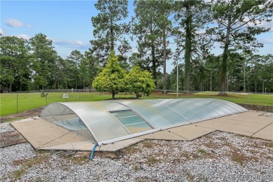 Live the dream in this stunning home on the golf course just on Cypress Lakes Golf Course in North Carolina - for sale on GolfHomes.com, golf home, golf lot