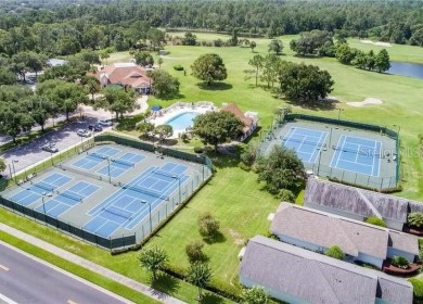 Under contract-accepting backup offers. Charming Home in Mount on Country Club of Mount Dora in Florida - for sale on GolfHomes.com, golf home, golf lot
