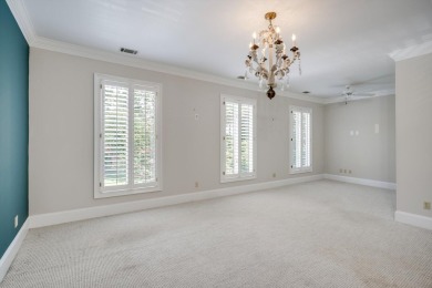 Nestled privately on coveted Charles Towne Place - a quiet on Woodside Plantation Country Club in South Carolina - for sale on GolfHomes.com, golf home, golf lot