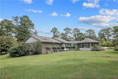 Live the dream in this stunning home on the golf course just on Cypress Lakes Golf Course in North Carolina - for sale on GolfHomes.com, golf home, golf lot