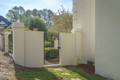 Nestled privately on coveted Charles Towne Place - a quiet on Woodside Plantation Country Club in South Carolina - for sale on GolfHomes.com, golf home, golf lot