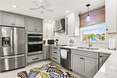 Waterfront living awaits in the highly sought-after community of on Saint Andrews South Golf Club in Florida - for sale on GolfHomes.com, golf home, golf lot