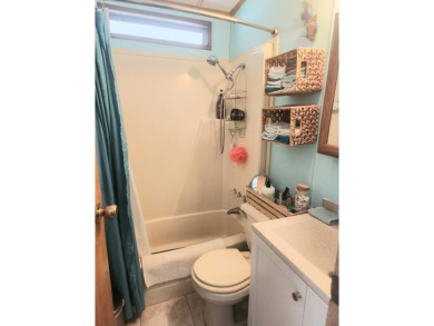 Being Sold Below Market Value!  1986 1/1 in pristine condition on Largo Golf Course in Florida - for sale on GolfHomes.com, golf home, golf lot