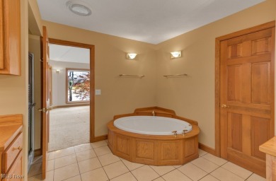 Discover the perfect blend of elegance and comfort in this on Lake Mohawk Golf Club in Ohio - for sale on GolfHomes.com, golf home, golf lot