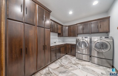 Thoughtfully designed custom ranch that sits in an eastside on Willow Run Golf Course in South Dakota - for sale on GolfHomes.com, golf home, golf lot