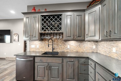 Thoughtfully designed custom ranch that sits in an eastside on Willow Run Golf Course in South Dakota - for sale on GolfHomes.com, golf home, golf lot