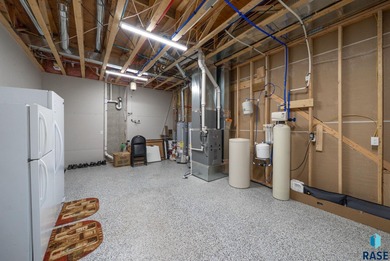 Thoughtfully designed custom ranch that sits in an eastside on Willow Run Golf Course in South Dakota - for sale on GolfHomes.com, golf home, golf lot