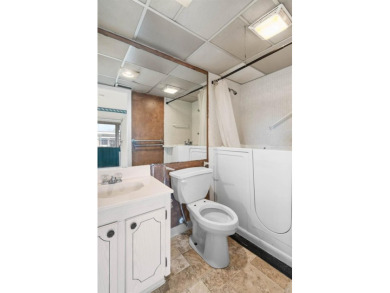 This partially furnished 1-bedroom, 1.5-bath condo is located in on Sandpiper Golf Club in Florida - for sale on GolfHomes.com, golf home, golf lot
