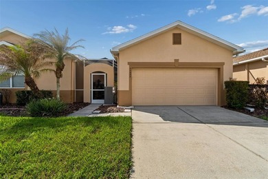 Welcome to 20930 Jaffa Lane in Land O' Lakes, located inside the on The Groves Golf and Country Club in Florida - for sale on GolfHomes.com, golf home, golf lot