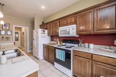 Experience effortless one-level living in this classic brick and on Ponce De Leon Golf Course in Arkansas - for sale on GolfHomes.com, golf home, golf lot