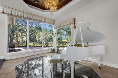 Luxurious lakeside living beckons you to your own private on Deer Island Country Club in Florida - for sale on GolfHomes.com, golf home, golf lot