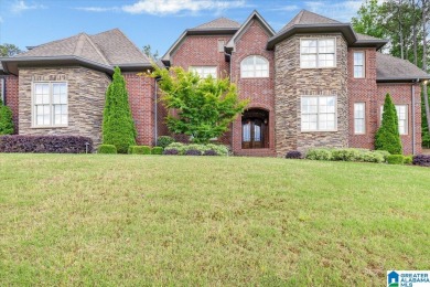 Step into luxury with this breathtaking property nestled in the on Ross Bridge Golf Resort in Alabama - for sale on GolfHomes.com, golf home, golf lot