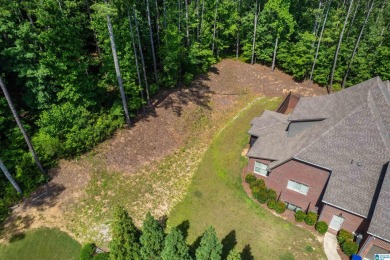 Step into luxury with this breathtaking property nestled in the on Ross Bridge Golf Resort in Alabama - for sale on GolfHomes.com, golf home, golf lot