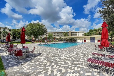 Welcome to paradise! Beautifully remodeled condo on the TOP on Wynmoor Golf Course in Florida - for sale on GolfHomes.com, golf home, golf lot