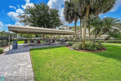 Welcome to paradise! Beautifully remodeled condo on the TOP on Wynmoor Golf Course in Florida - for sale on GolfHomes.com, golf home, golf lot