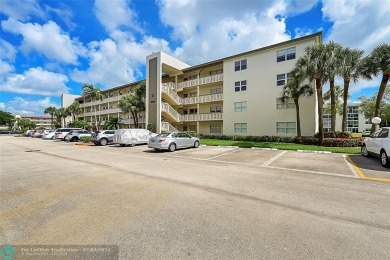 Welcome to paradise! Beautifully remodeled condo on the TOP on Wynmoor Golf Course in Florida - for sale on GolfHomes.com, golf home, golf lot