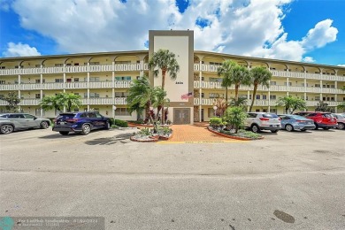 Welcome to paradise! Beautifully remodeled condo on the TOP on Wynmoor Golf Course in Florida - for sale on GolfHomes.com, golf home, golf lot