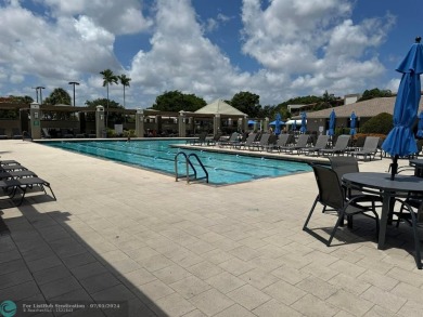 Welcome to paradise! Beautifully remodeled condo on the TOP on Wynmoor Golf Course in Florida - for sale on GolfHomes.com, golf home, golf lot