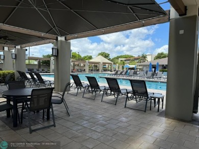 Welcome to paradise! Beautifully remodeled condo on the TOP on Wynmoor Golf Course in Florida - for sale on GolfHomes.com, golf home, golf lot