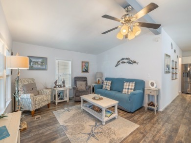 Meticulously maintained, move-in ready home with all the on Barefoot Bay Golf Course in Florida - for sale on GolfHomes.com, golf home, golf lot