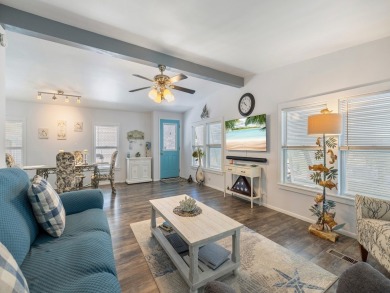 Meticulously maintained, move-in ready home with all the on Barefoot Bay Golf Course in Florida - for sale on GolfHomes.com, golf home, golf lot