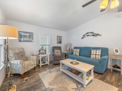 Meticulously maintained, move-in ready home with all the on Barefoot Bay Golf Course in Florida - for sale on GolfHomes.com, golf home, golf lot