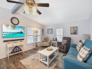 Meticulously maintained, move-in ready home with all the on Barefoot Bay Golf Course in Florida - for sale on GolfHomes.com, golf home, golf lot