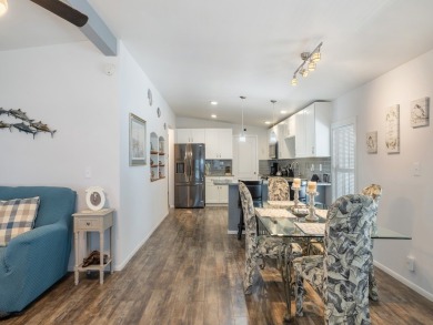 Meticulously maintained, move-in ready home with all the on Barefoot Bay Golf Course in Florida - for sale on GolfHomes.com, golf home, golf lot