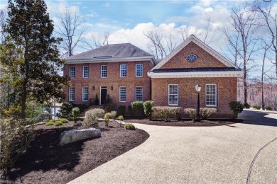 Nestled on a secluded peninsula in the prestigious Ford's Colony on Fords Colony Country Club in Virginia - for sale on GolfHomes.com, golf home, golf lot