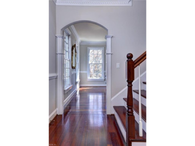 Nestled on a secluded peninsula in the prestigious Ford's Colony on Fords Colony Country Club in Virginia - for sale on GolfHomes.com, golf home, golf lot