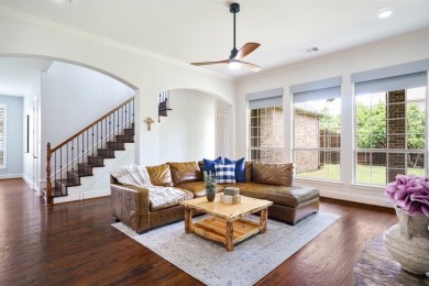 Situated on a beautifully elevated lot with mature trees and on The Golf Club At Twin Creeks in Texas - for sale on GolfHomes.com, golf home, golf lot