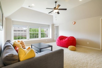 Situated on a beautifully elevated lot with mature trees and on The Golf Club At Twin Creeks in Texas - for sale on GolfHomes.com, golf home, golf lot