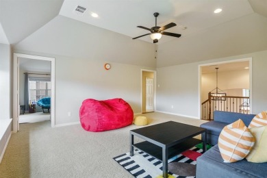 Situated on a beautifully elevated lot with mature trees and on The Golf Club At Twin Creeks in Texas - for sale on GolfHomes.com, golf home, golf lot