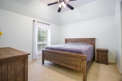Situated on a beautifully elevated lot with mature trees and on The Golf Club At Twin Creeks in Texas - for sale on GolfHomes.com, golf home, golf lot