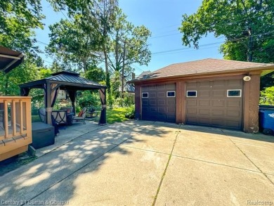 Welcome to this elegant 5-bedroom, 4.5-bathroom home in the on Detroit Golf Club  in Michigan - for sale on GolfHomes.com, golf home, golf lot