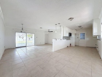 Perfect for Investors or for you who wants to make this property on Mangrove Bay Golf Course in Florida - for sale on GolfHomes.com, golf home, golf lot