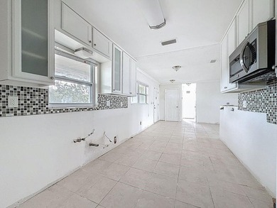 Perfect for Investors or for you who wants to make this property on Mangrove Bay Golf Course in Florida - for sale on GolfHomes.com, golf home, golf lot