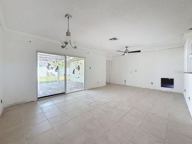 Perfect for Investors or for you who wants to make this property on Mangrove Bay Golf Course in Florida - for sale on GolfHomes.com, golf home, golf lot