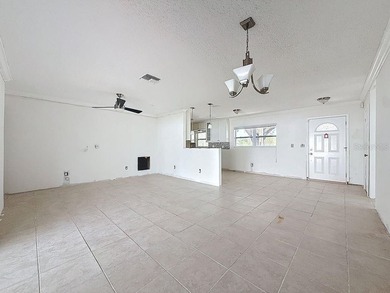 Perfect for Investors or for you who wants to make this property on Mangrove Bay Golf Course in Florida - for sale on GolfHomes.com, golf home, golf lot