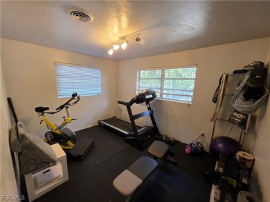 Located in the desirable McGregor Estates corridor of Fort Myers on Fort Myers Country Club in Florida - for sale on GolfHomes.com, golf home, golf lot