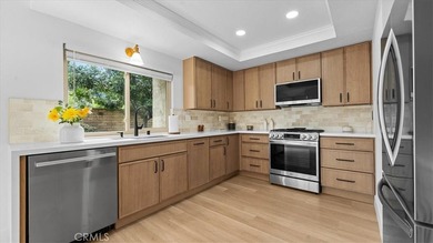Stunning fully remodeled 3 bedroom, 3 bath townhouse showcasing on Mission Viejo Country Club in California - for sale on GolfHomes.com, golf home, golf lot
